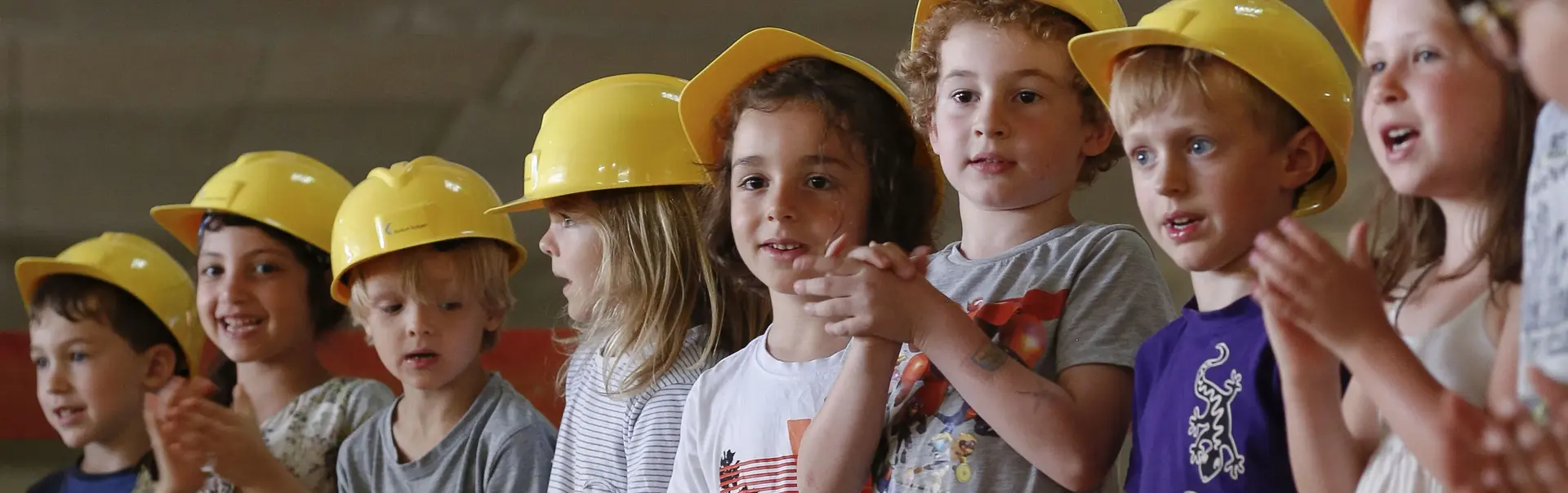 Kundert with construction helmets