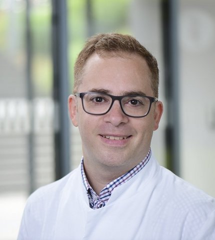 Dr. Emre Tanay