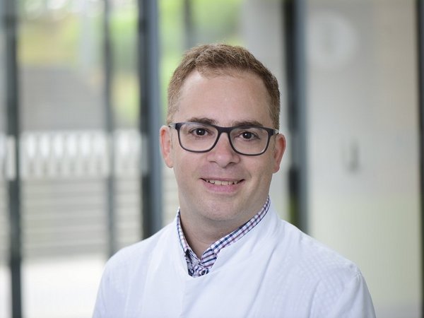 Dr. Emre Tanay